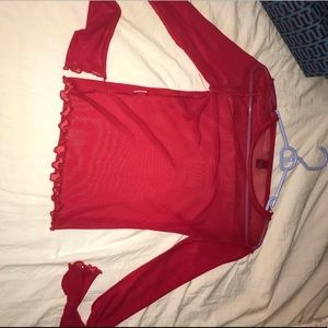 Sheer red top with scalloped bottom